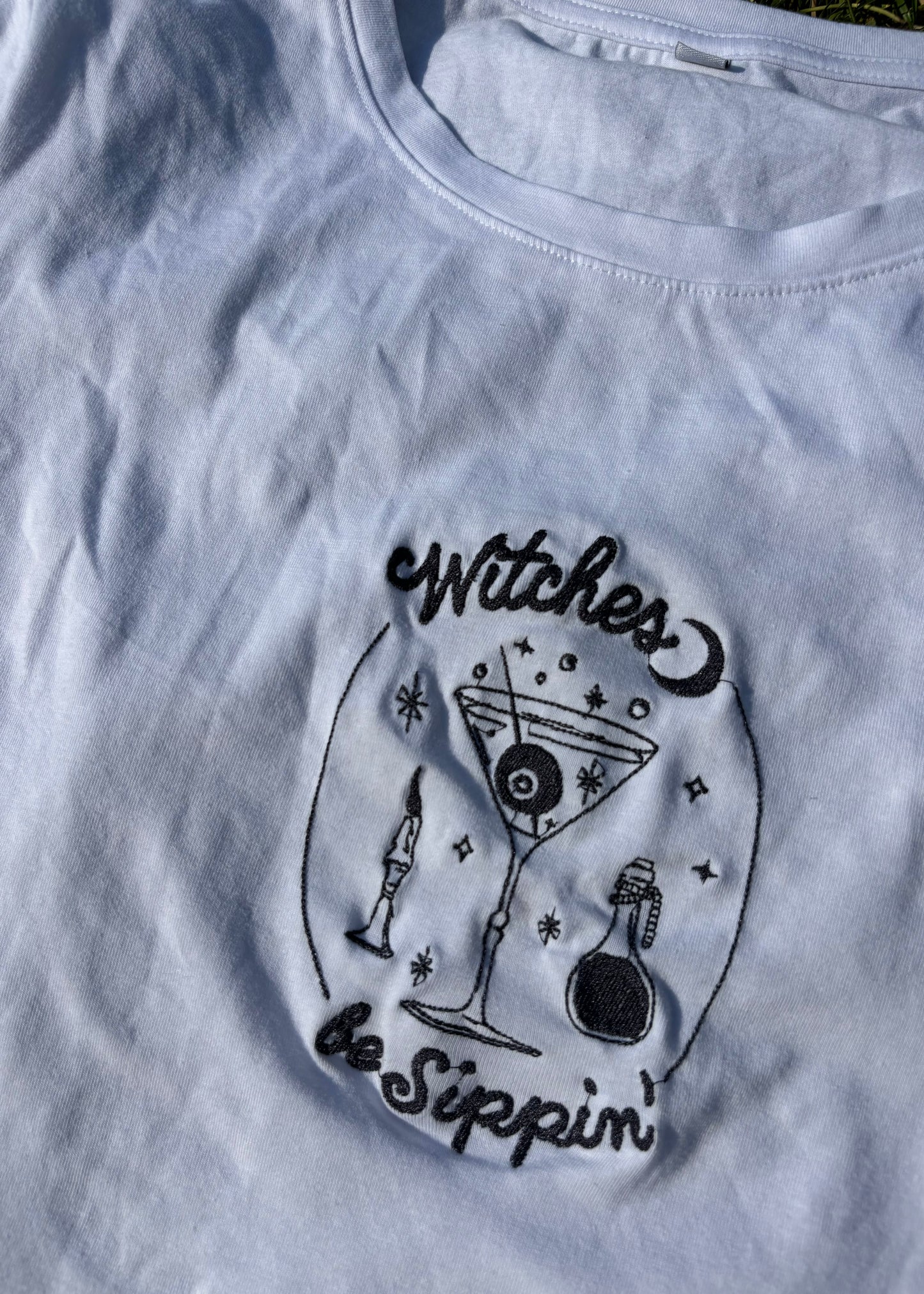 Witches be sippin' baby tee