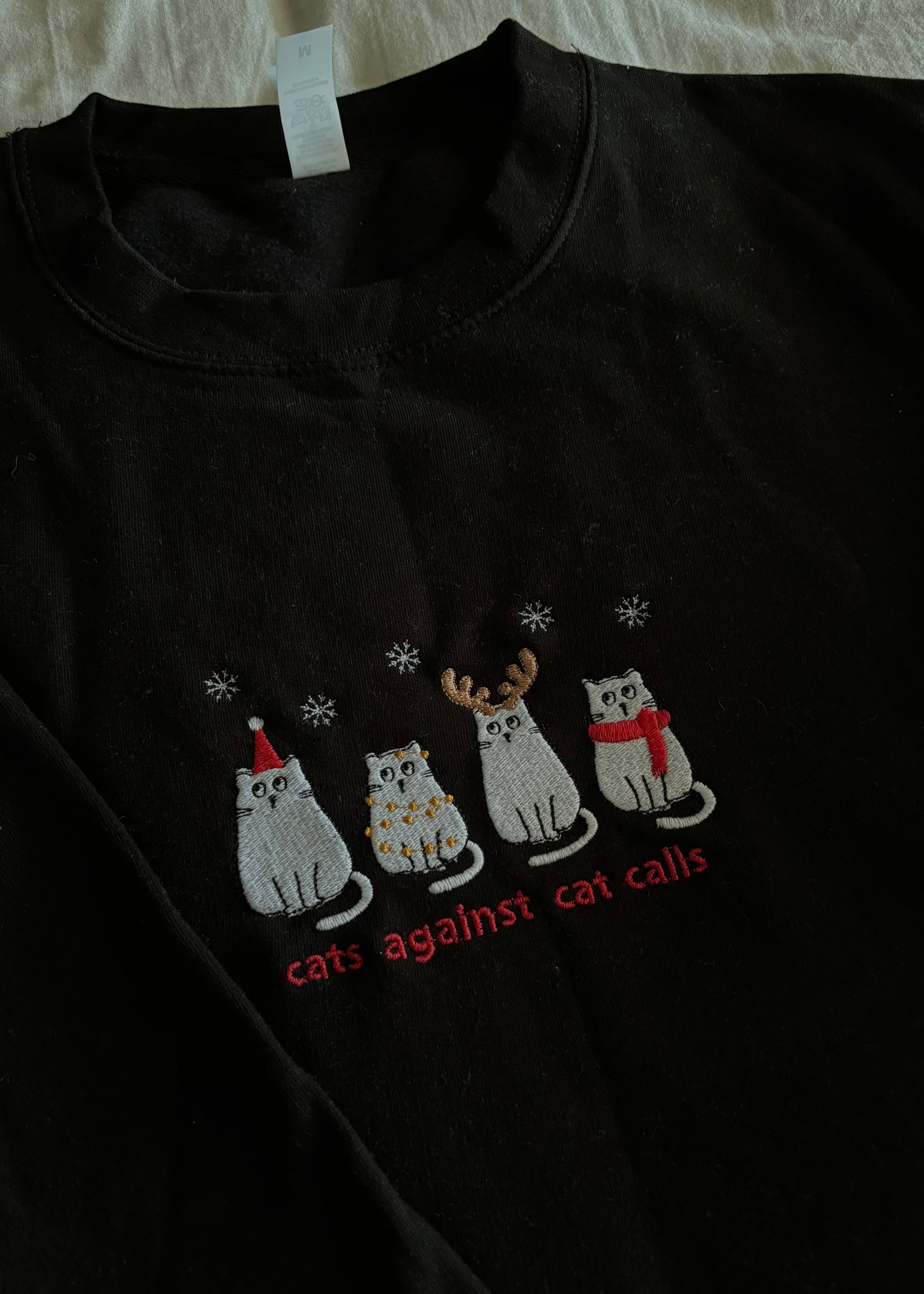 CATS AGAINST CAT CALLS SWEATSHIRT