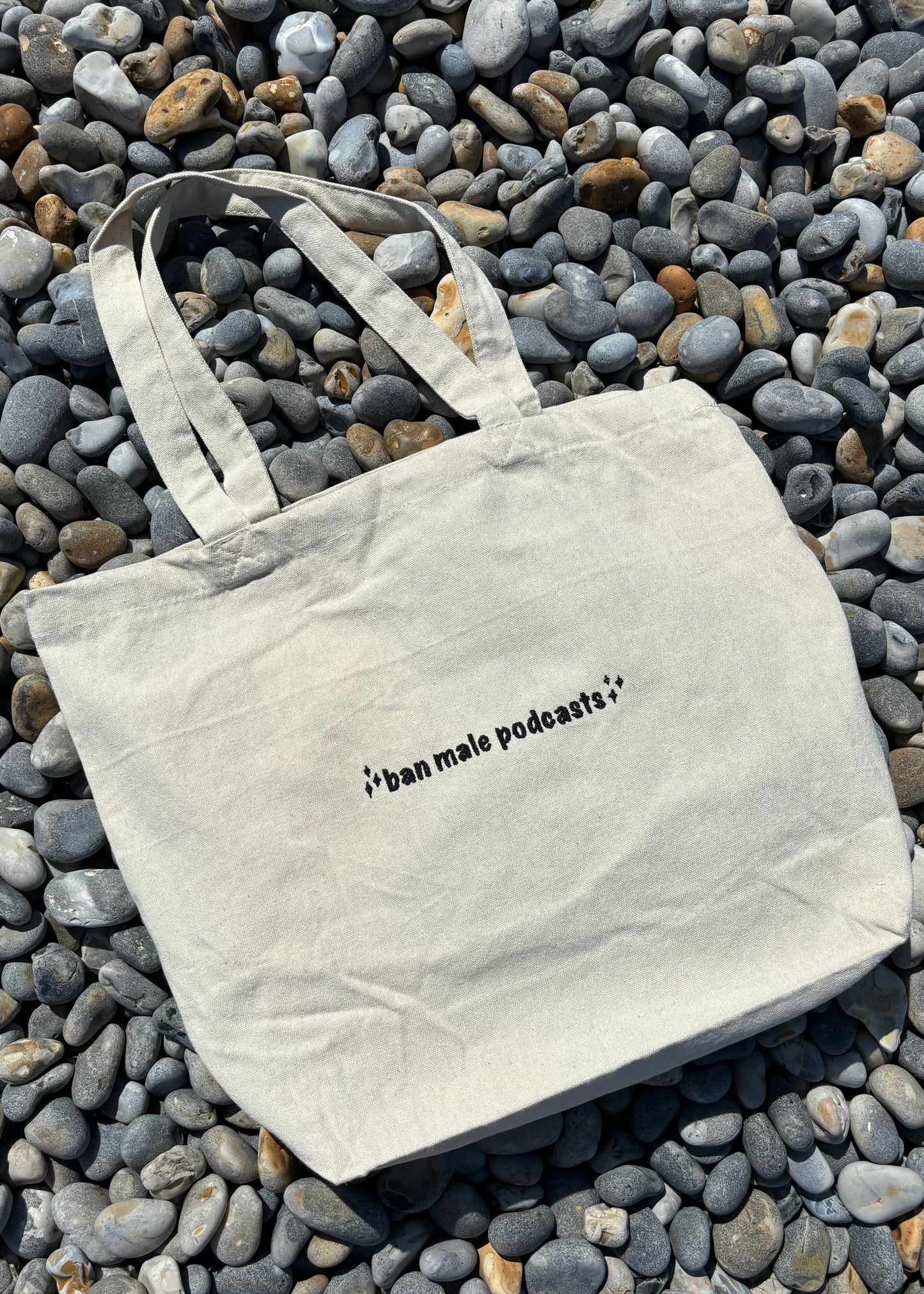 ban male podcasts tote bag