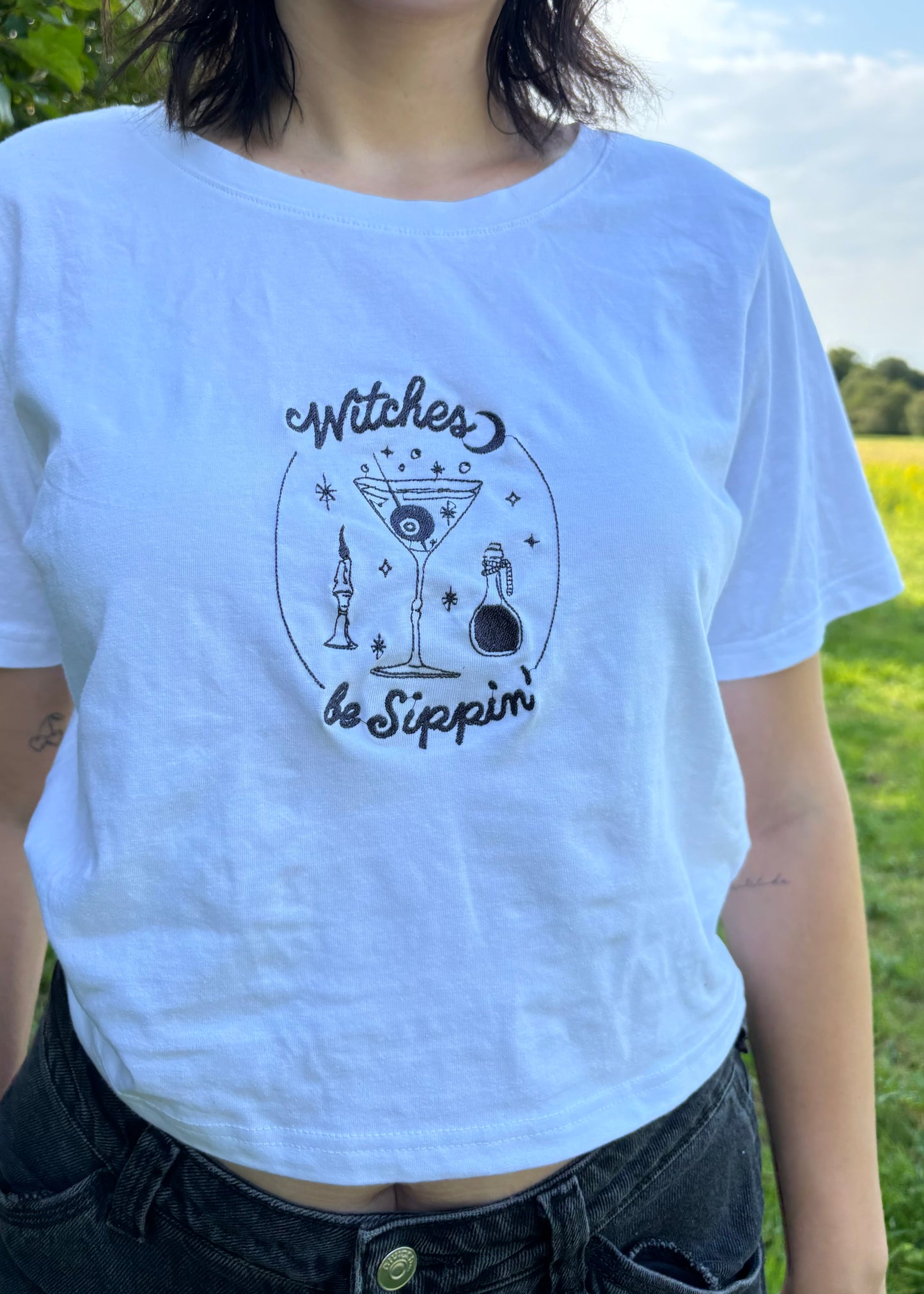 Witches be sippin' baby tee